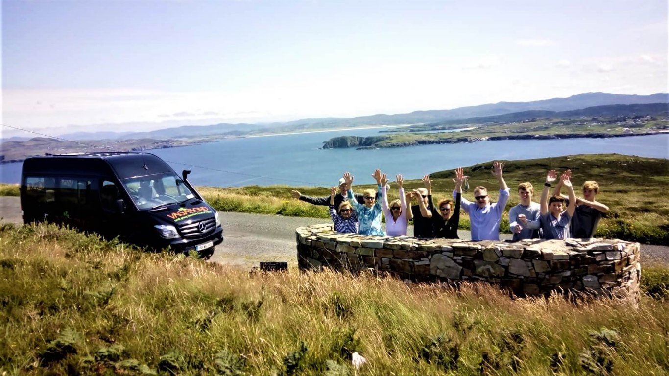 Happy Vagabond tour group enjoying a private tour of Ireland